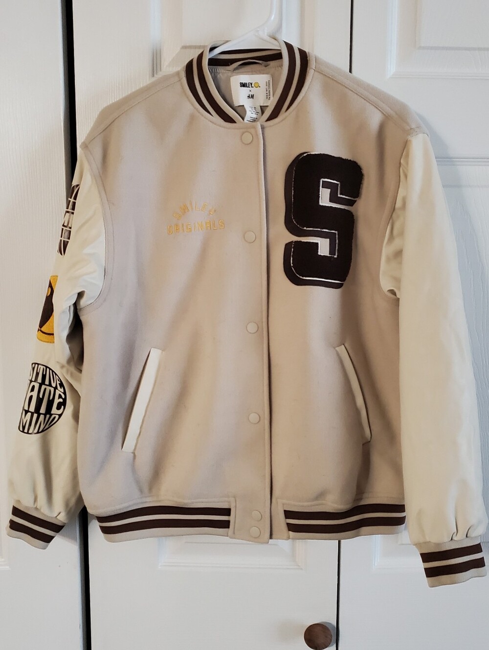 SMILEY X H & M XS VARSITY JACKET. LONG SLEEVES.